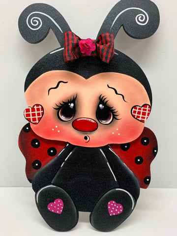 ladybug with bow