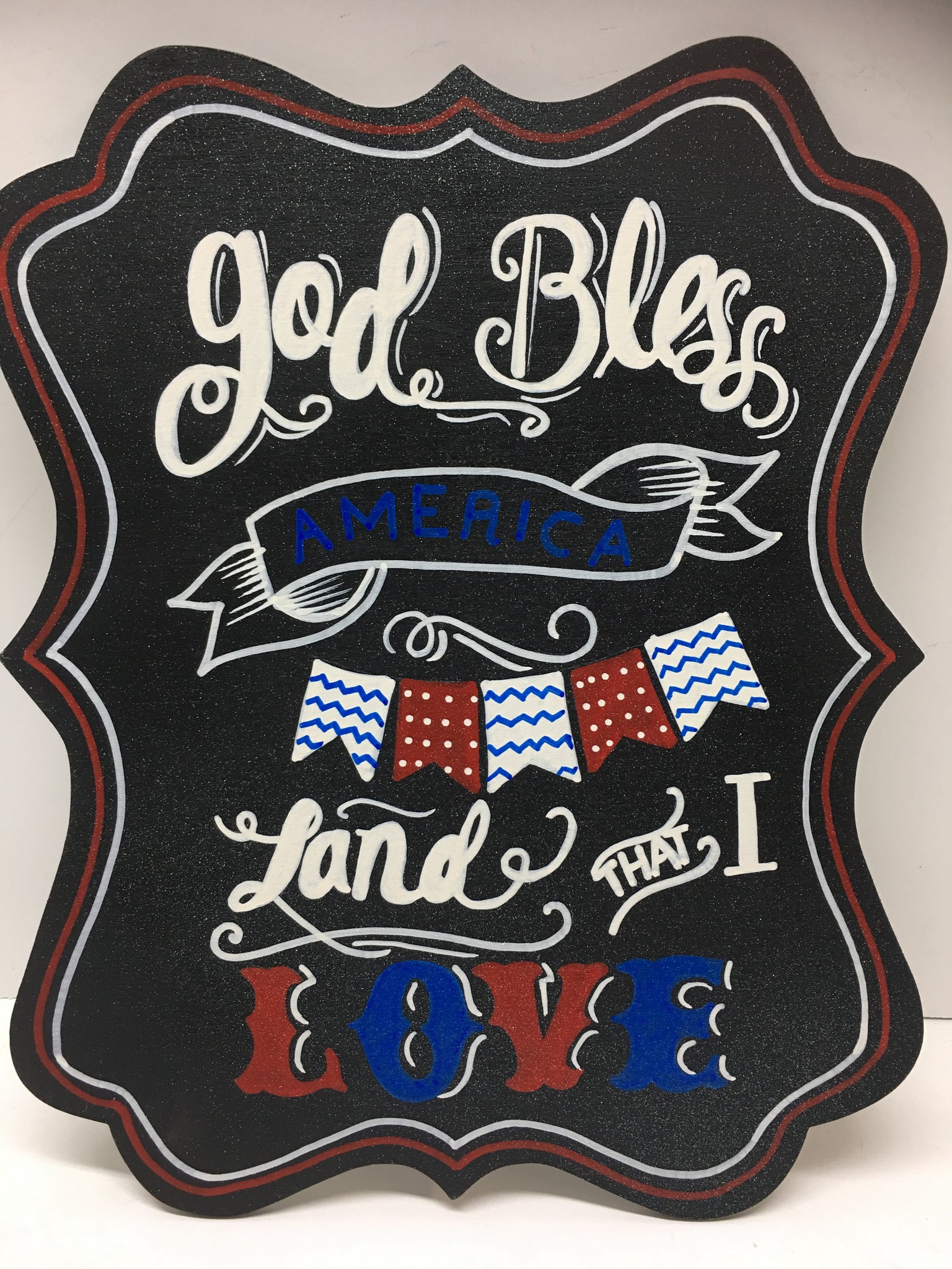 #706 Scrolled patriotic sign 12x10”