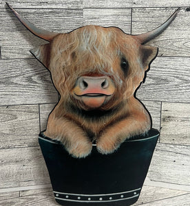 Highland cow cartoon in a bucket